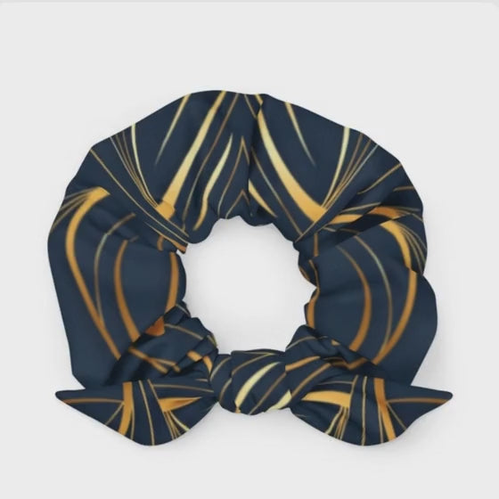 THE SCRUNCHIE 1. (LUXURY DEPT)